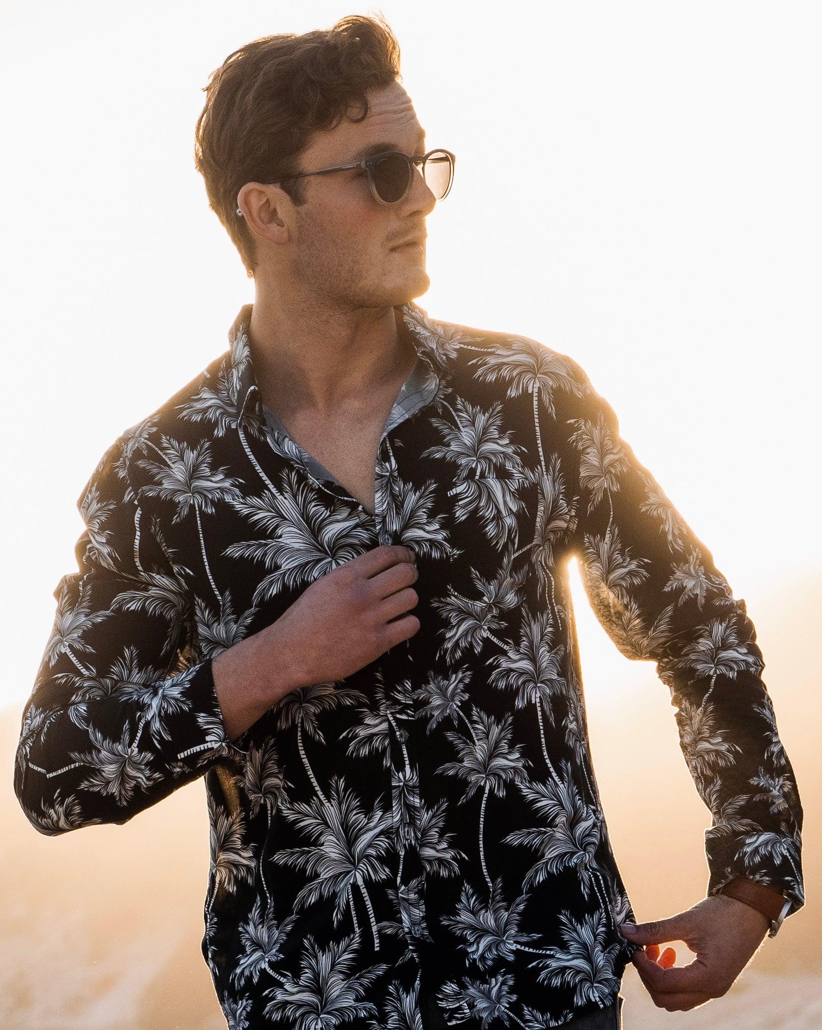 Long Sleeve Shirt - PalmtasticStrange ParadiseStrange Paradise
Men's Long Sleeve Shirt - Palmtastic is a slim fit shirt with button up fastening and a single chest pocket. The shirt showcases a smart casual look and is paired eMen's Long Sleeve Shirt - Palmtastic