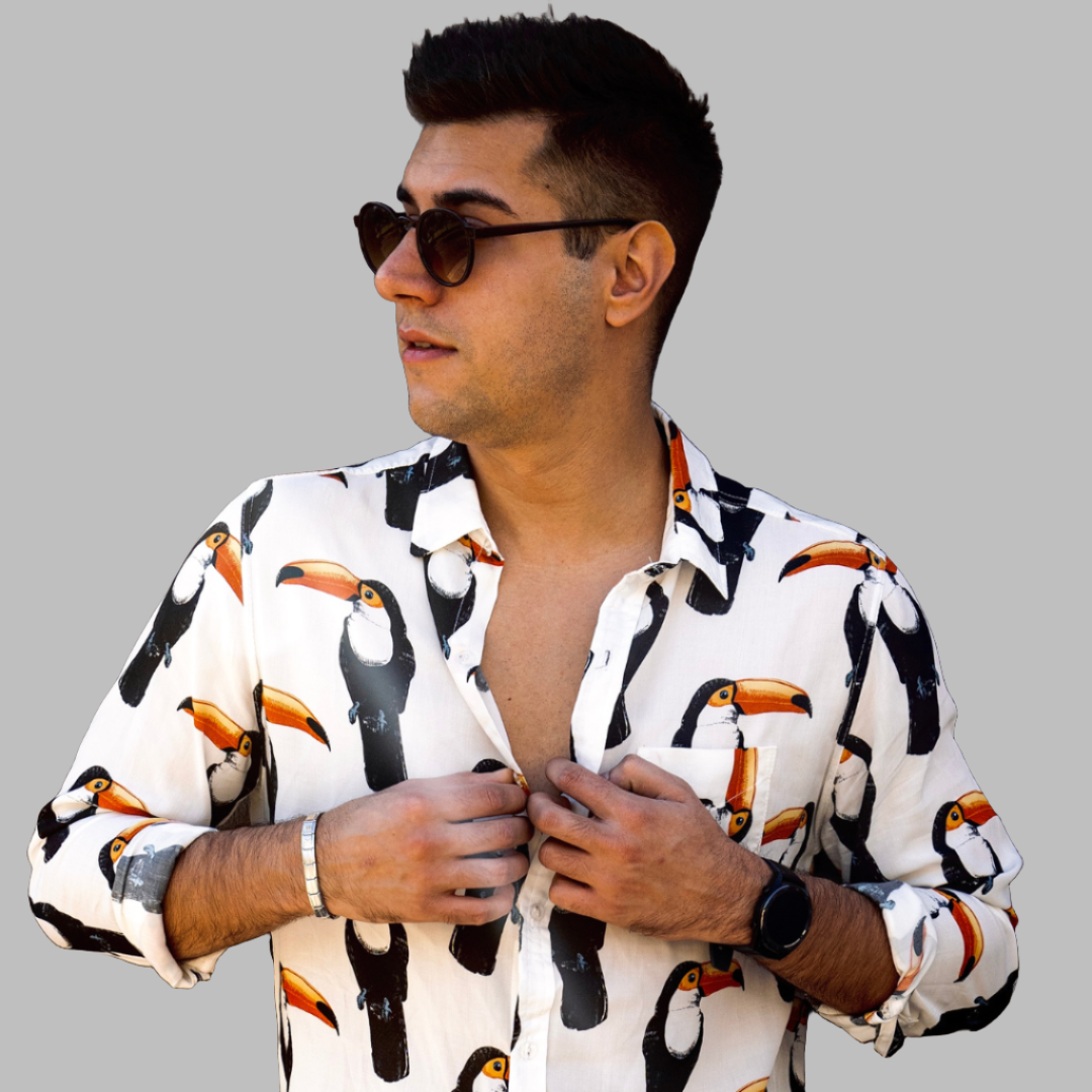 Long Sleeve Shirt - ToucanStrange ParadiseStrange Paradise
Men's Long Sleeve Shirt - Toucan Do It is a slim fit shirt with button up fastening and a single chest pocket. The shirt showcases a smart casual look and is pairedMen's Long Sleeve Shirt - Toucan Do It