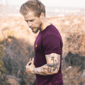 Rolled Muscle Tee - BurgundyStrange ParadiseStrange ParadiseOur Rolled Muscle Tees are designed for everyday wear. Our fabric delivers a product for those with a demanding and versatile lifestyle. From the workplace or gym, tRolled Muscle Tee - Burgundy