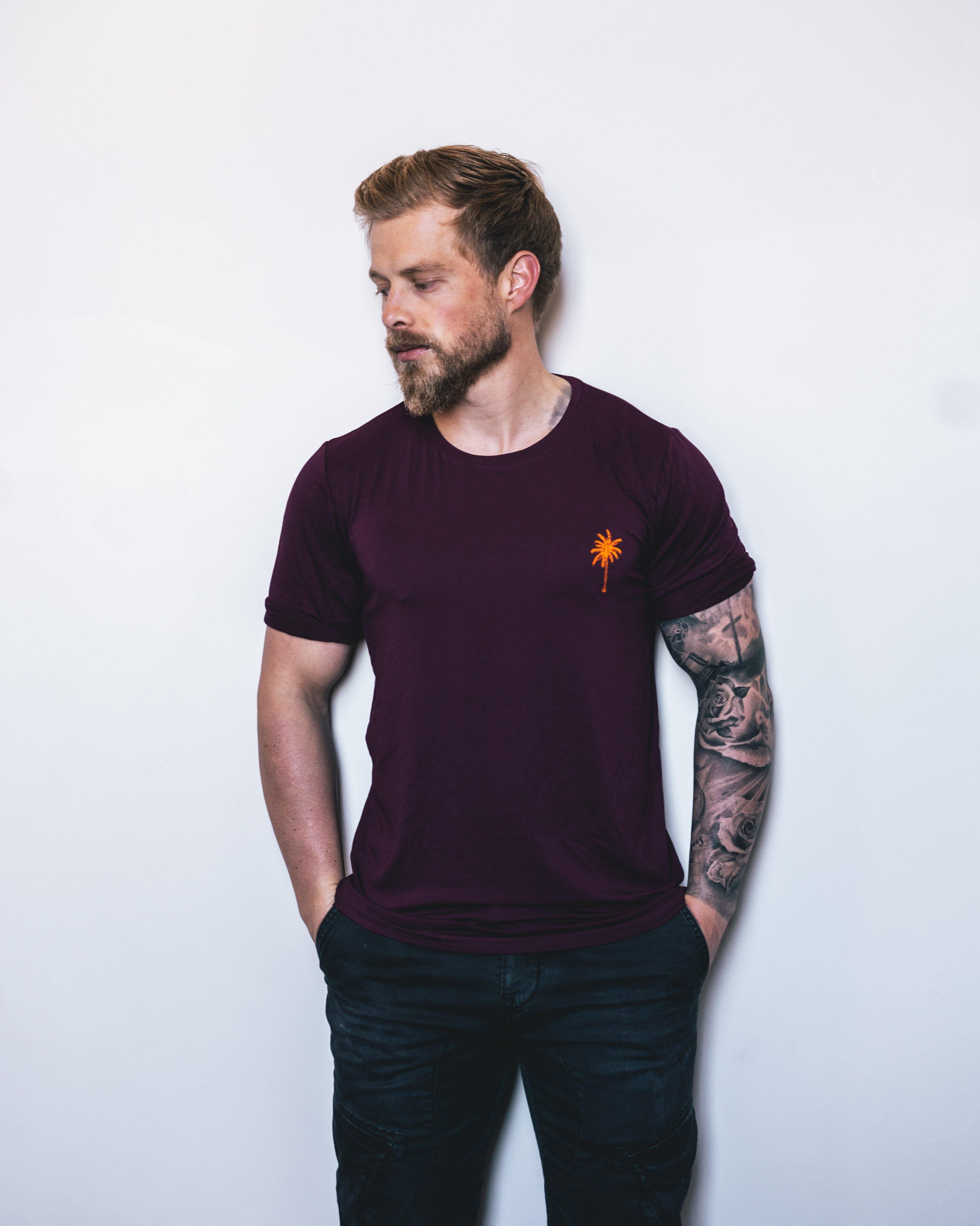 Rolled Muscle Tee - BurgundyStrange ParadiseStrange ParadiseOur Rolled Muscle Tees are designed for everyday wear. Our fabric delivers a product for those with a demanding and versatile lifestyle. From the workplace or gym, tRolled Muscle Tee - Burgundy