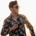 Long Sleeve Shirt - PalmtasticStrange ParadiseStrange Paradise
Men's Long Sleeve Shirt - Palmtastic is a slim fit shirt with button up fastening and a single chest pocket. The shirt showcases a smart casual look and is paired eMen's Long Sleeve Shirt - Palmtastic
